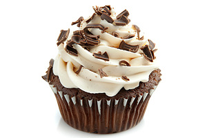 Chocolate cupcakes with white whipped cream on white background, a Food & Drink Photo by AlyaAnd