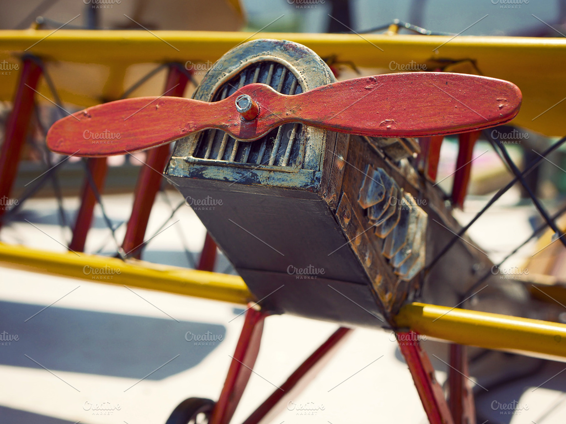 Antique plane at flea market featuring flea markets, airplanes, and planes, a Transportation Photo by Hit Pictures