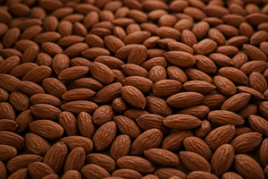 Close-up of raw whole almonds in a t, a Food & Drink Photo by professorinc