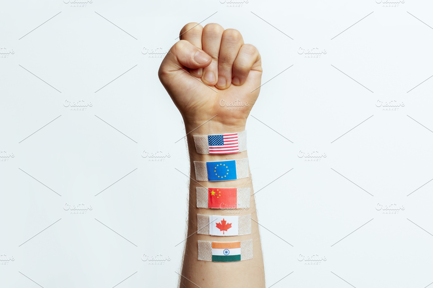 Raised Fist with World Flags - Global Economic Symbol, a Business Photo by Alliance Images