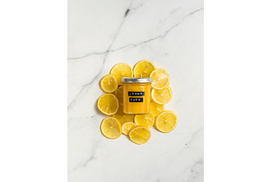 Homemade lemon curd in jar, top view, a Food & Drink Photo by Fascinadora