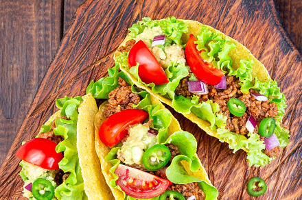 Taco shells with lettuce ground bee containing taco, shell, and lettuce, a Food & Drink Photo by iuliia_n