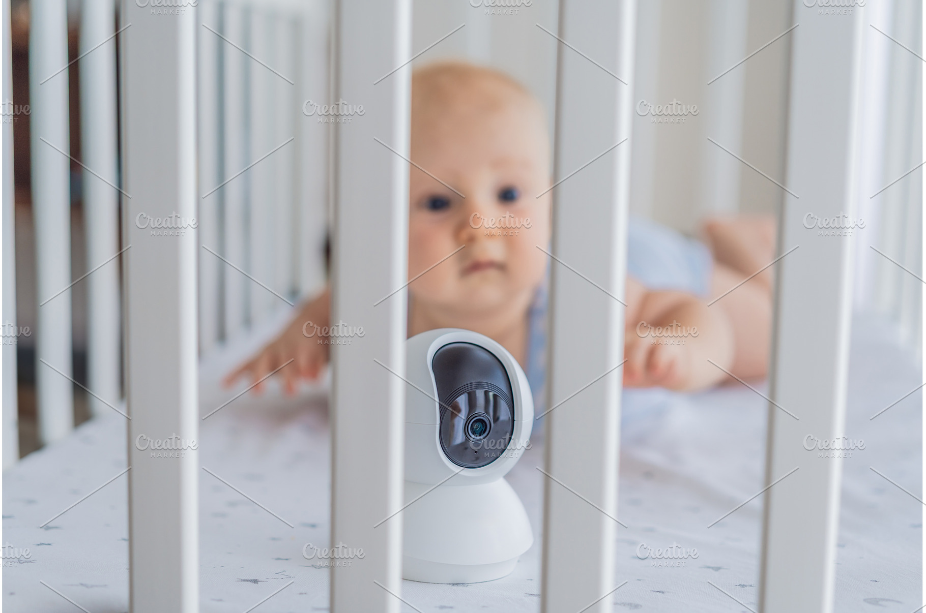 Baby monitor camera placed inside a, a Technology Photo by Elizaveta Galitskaya