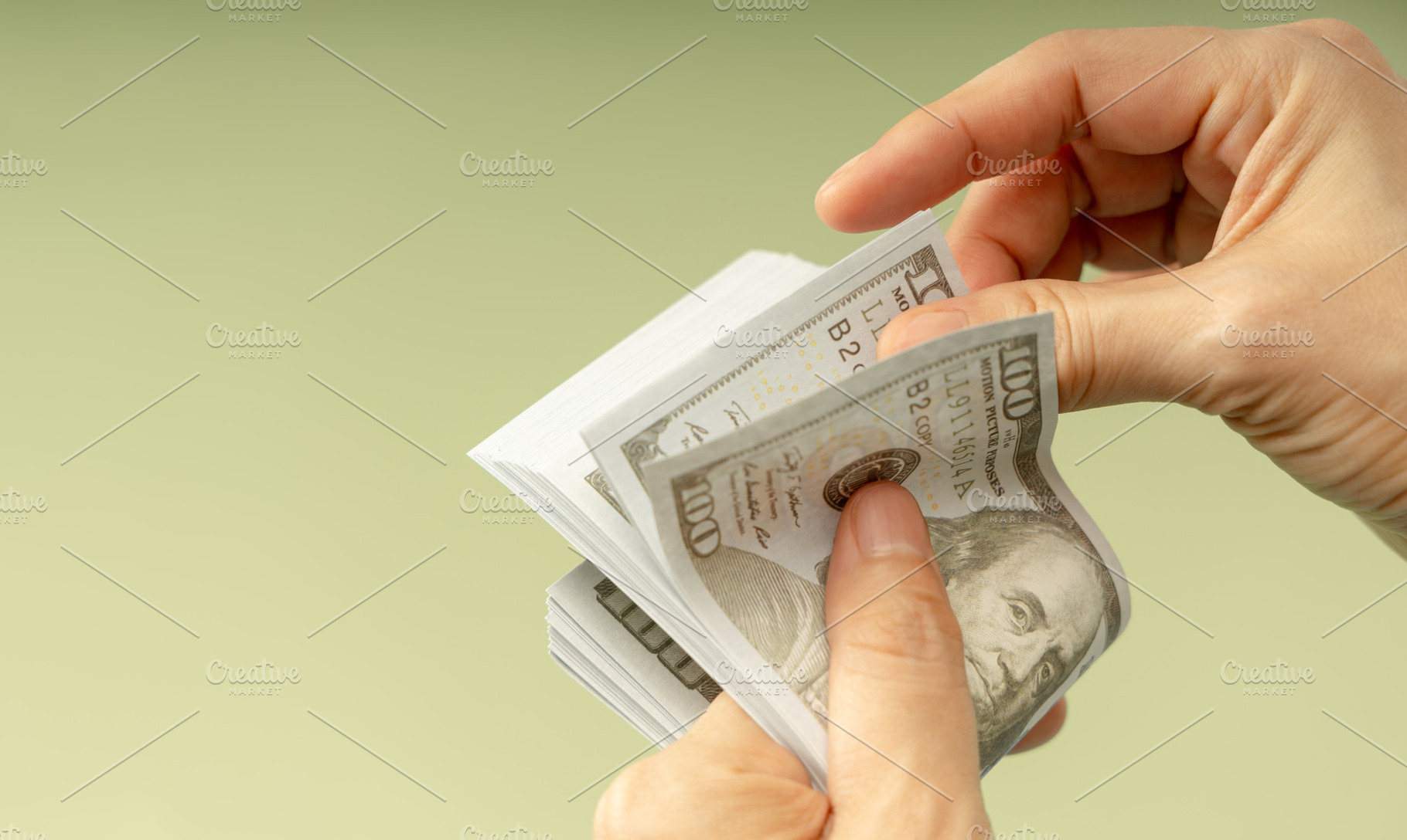 Hands counting US dollar bills, symbolizing finance, payment, ba, a Business Photo by salmon.black