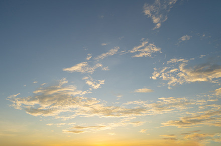 Sunset sky. Abstract nature background. Dramatic blue with orang, a Background Photo by Tampatra