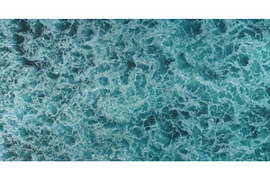 Turquoise ocean water surface with