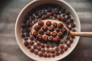 Milk with cereals featuring milk, cereals, and cereal