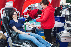 Young woman donating blood, a Health & Medical Photo by BOOCYS