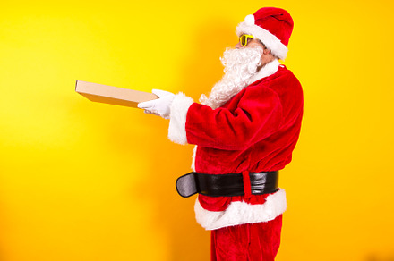 Santa claus with pizza featuring santa, claus, and christmas