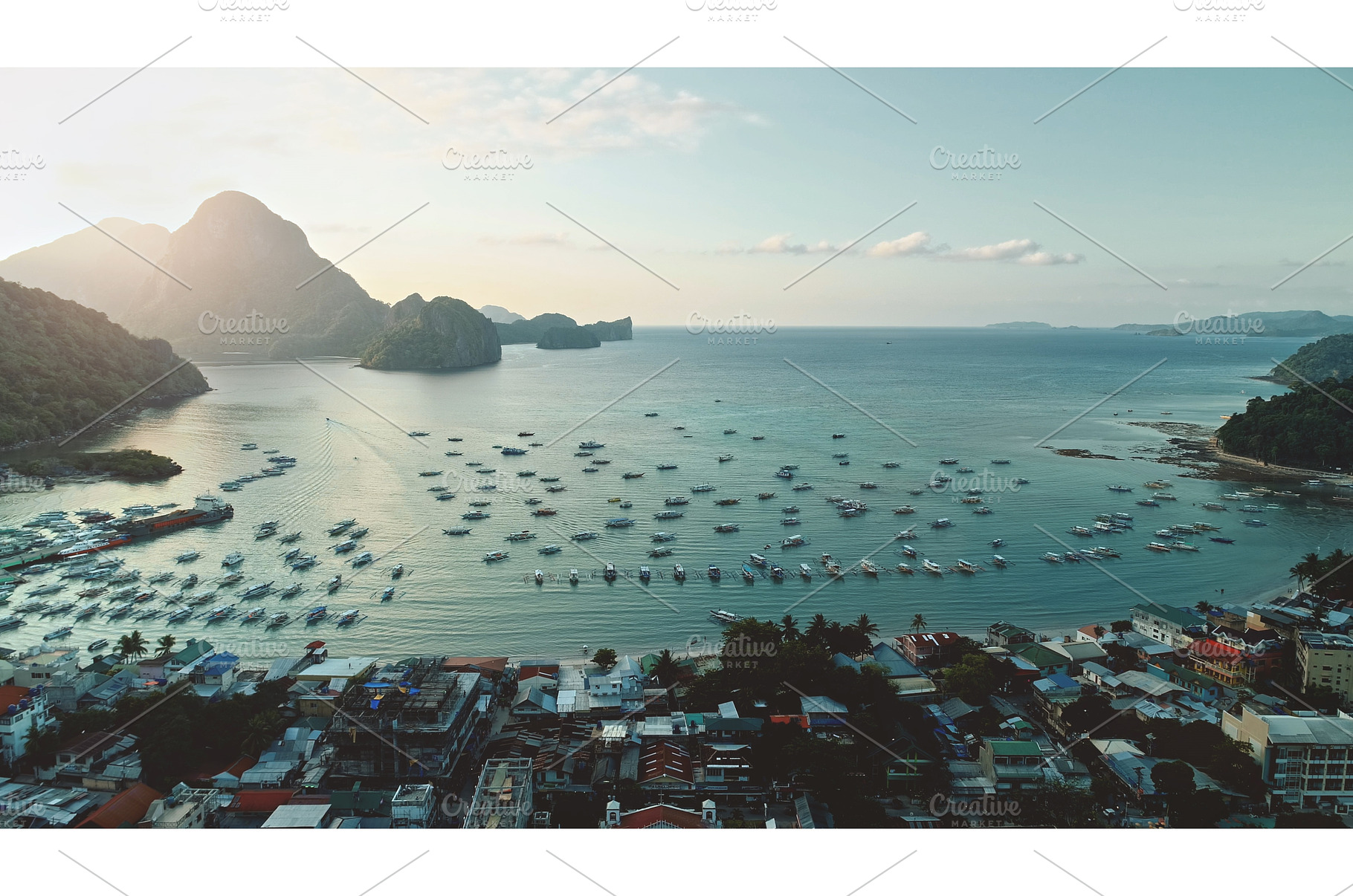 Sunrise at port town with mountain, a Nature Photo by Goinyk