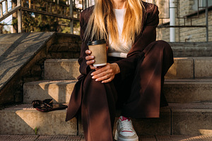 Coffee break outdoor leisure business woman cup, a Person Photo by Photo Drive Studio