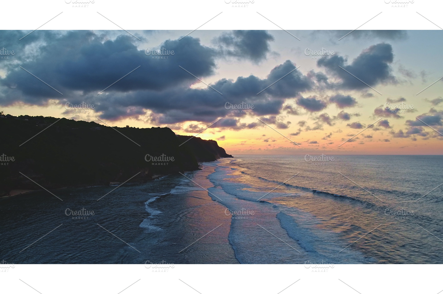 Sunset illuminating ocean waves, a Nature Photo by Goinyk