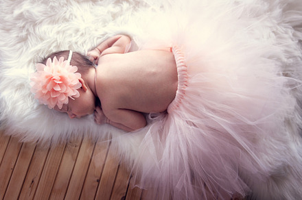 newborn baby girl with a flower in h, a Person Photo by Eni_fly