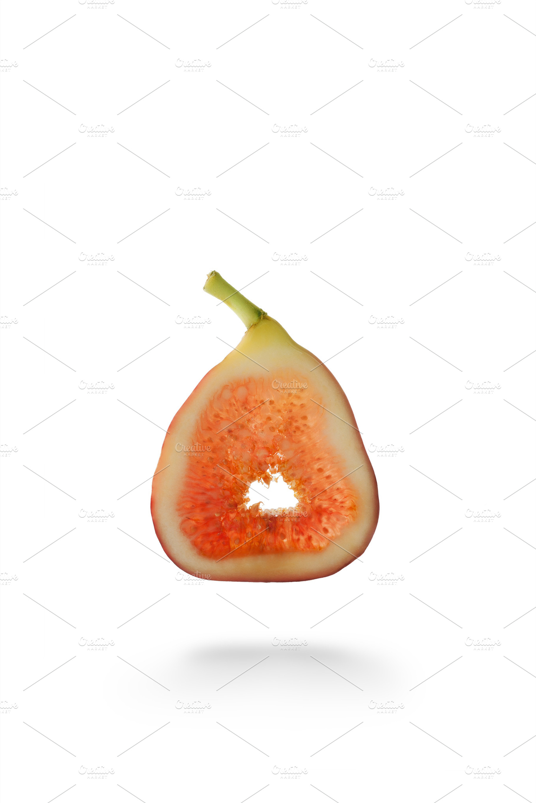 sliced fig, a Photo by dmitryersler