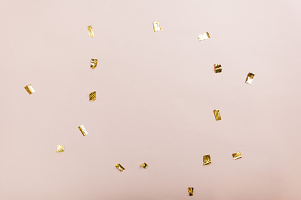Flatlay of golden confetti on pale, an Arts & Entertainment Photo by Polinabelphoto