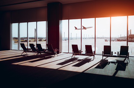 Airport waiting hall, plane outside, a Business Photo by SkyNext