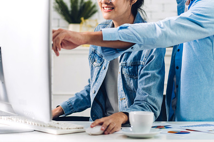 Young asian couple relaxing using desktop computer working and v, a Person Photo by Art_Photo