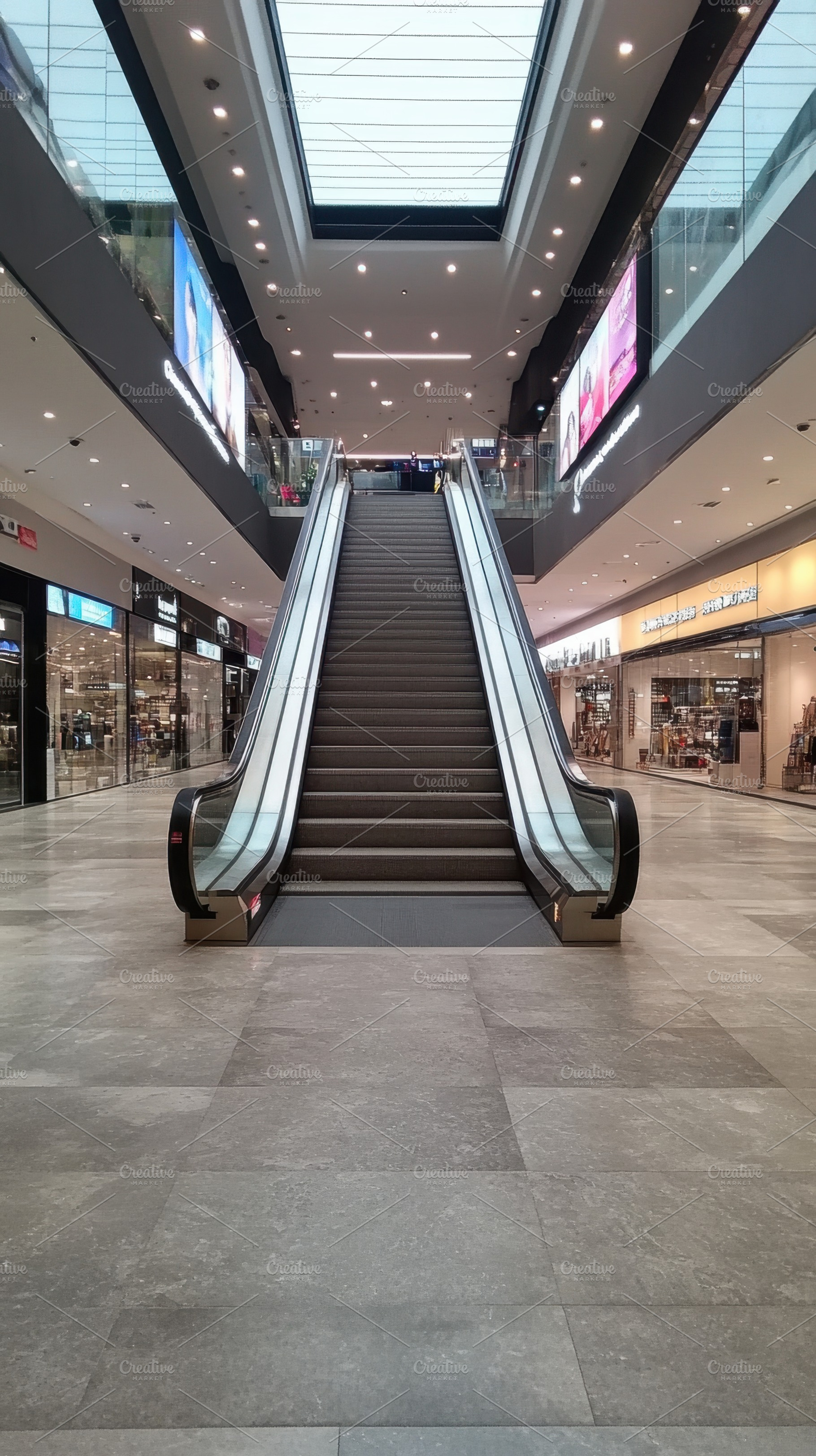 Escalator in modern shopping center, a Photo by Beautiful things