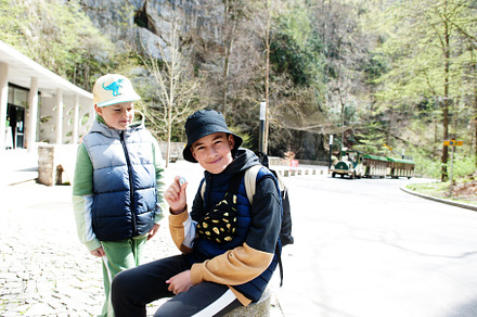 Brothers explores at Punkva Caves outdoor near rocks, Czech Repu, a Nature Photo by AS photostudio