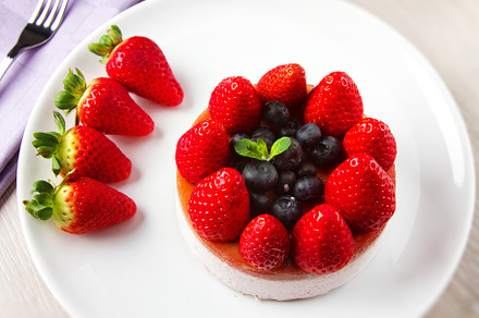 Strawberry and bluberry cheesecake. High quality photo, a Food & Drink Photo by FoodStock
