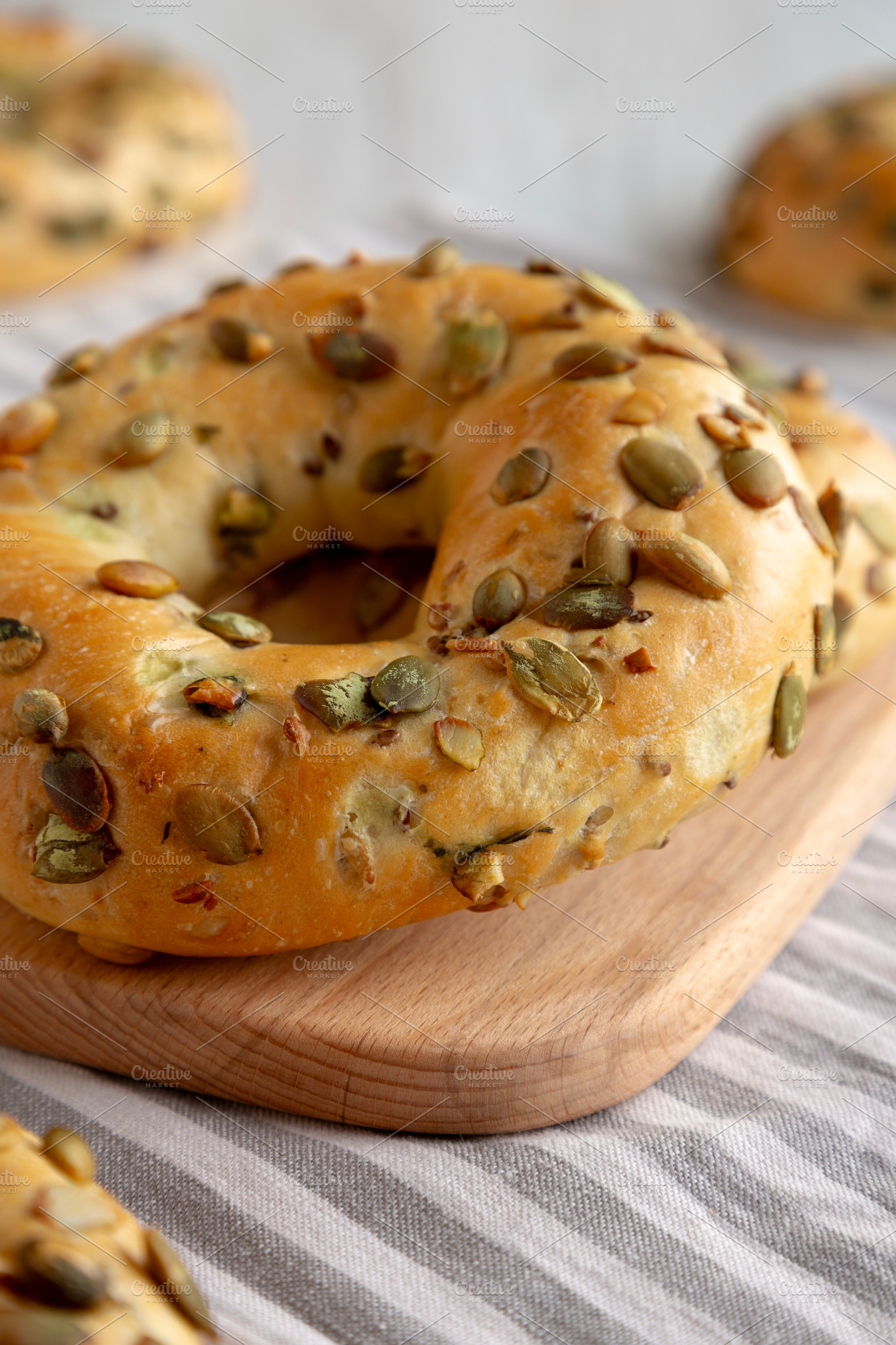 Homemade Healthy Organic Pumpkin Seed Bagels for Breakfast, side, a Food & Drink Photo by LiudmylaChuhunova