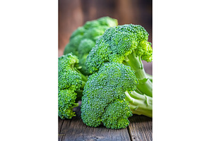 Fresh green broccoli on wooden, a Food & Drink Photo by Lermont51