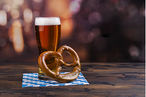 Glass of beer and pretzel