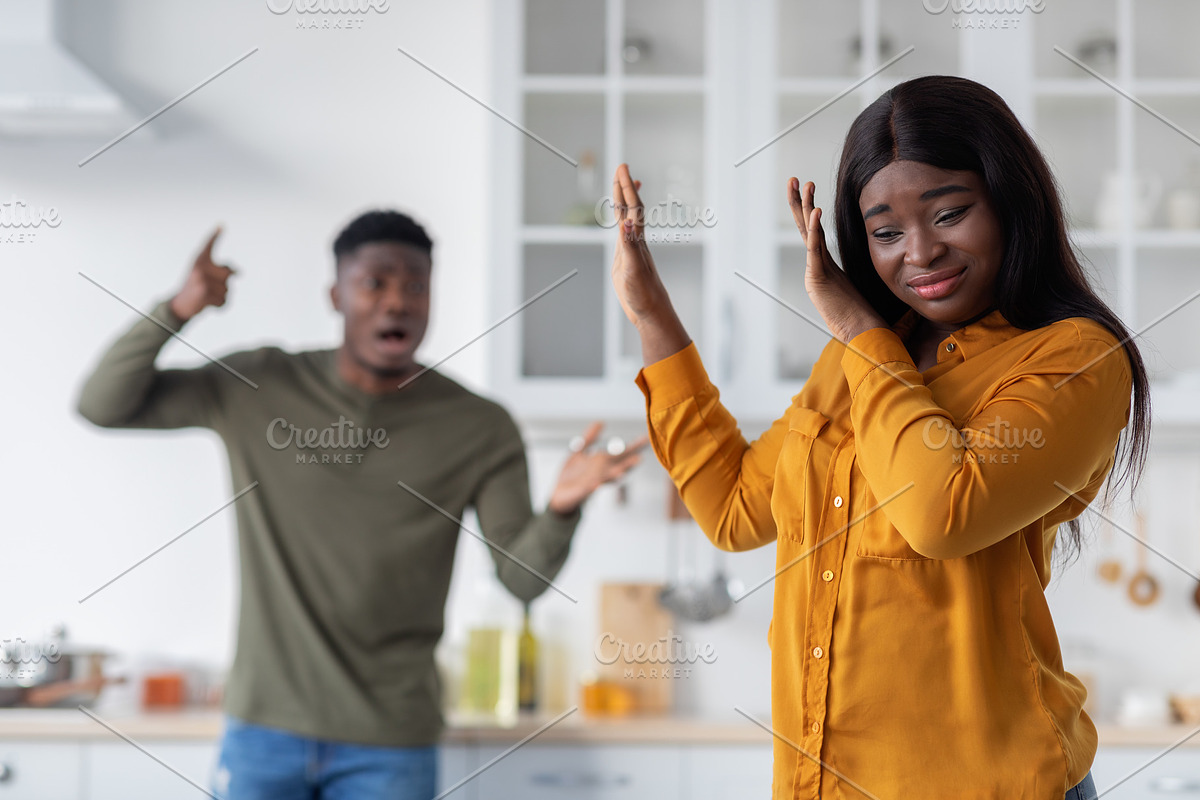 Psychological Abuse. Angry Black Man Shouting At His Scared Girlfriend In Kitch, a Photo by Prostock-Studio (Photo 3 of 3)