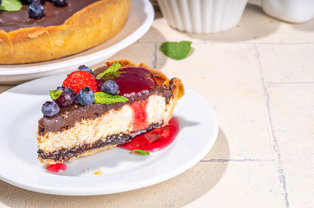 Homemade cheesecake with chocolate and berry, a Food & Drink Photo by Rimma