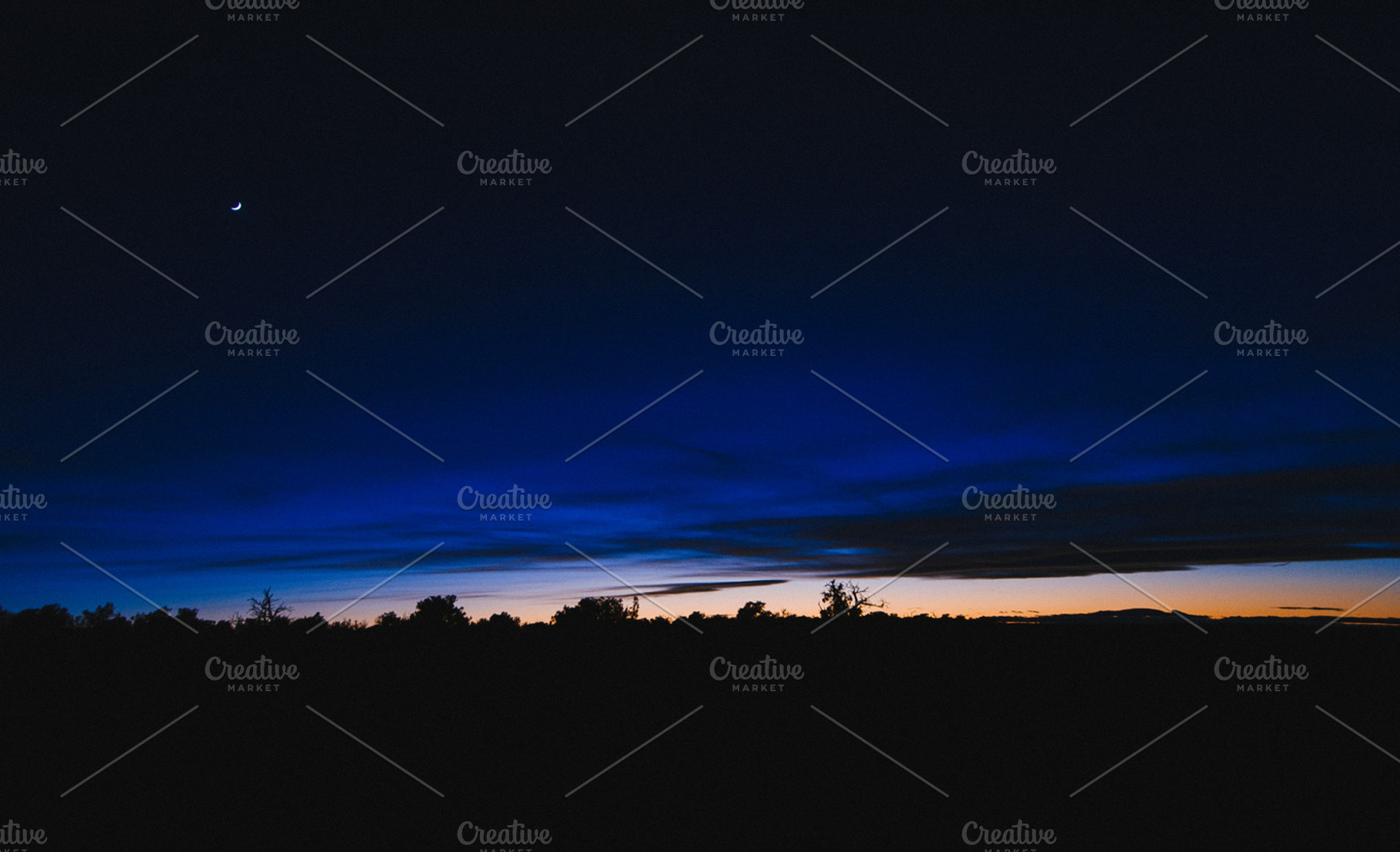 Desert sunset with crescent moon containing sky, sunset, and dusk, a Nature Photo by Stephanie Mikuls