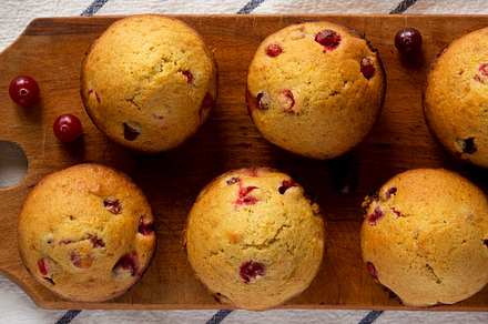 Homemade Cranberry Muffins with Orange Zest on a rustic wooden b, a Food & Drink Photo by LiudmylaChuhunova