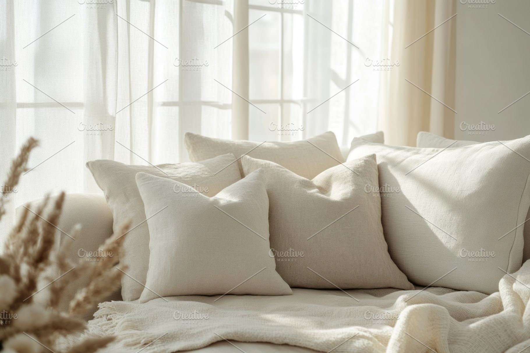 A serene display of soft beige pillows on a cozy sofa, illuminated by gentle su, a Background Photo by ImageMir