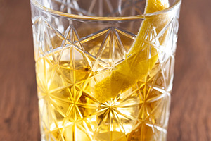 Rusty Nail Cocktail with Lemon Peel in Crystal Glass, a Food & Drink Photo by etorres69
