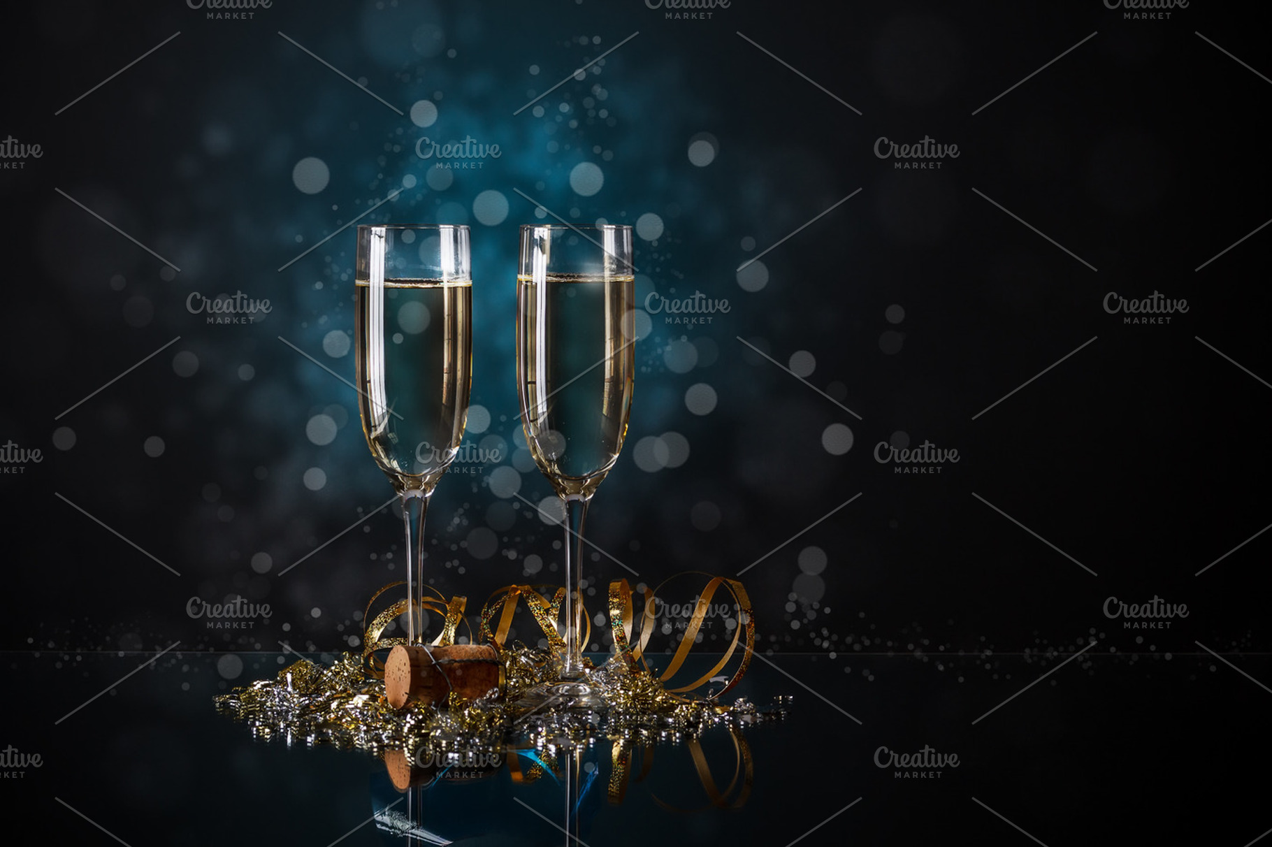 Glasses Of Champagne Containing Blue Two And Nobody