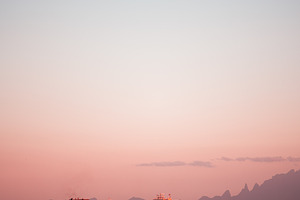 Sunset container ship seascape, a Transportation Photo by SkyNext