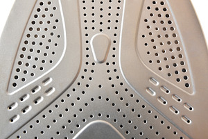 Detail of metal soleplate of a steam iron, a Sports & Recreation Photo by Davizro's Market