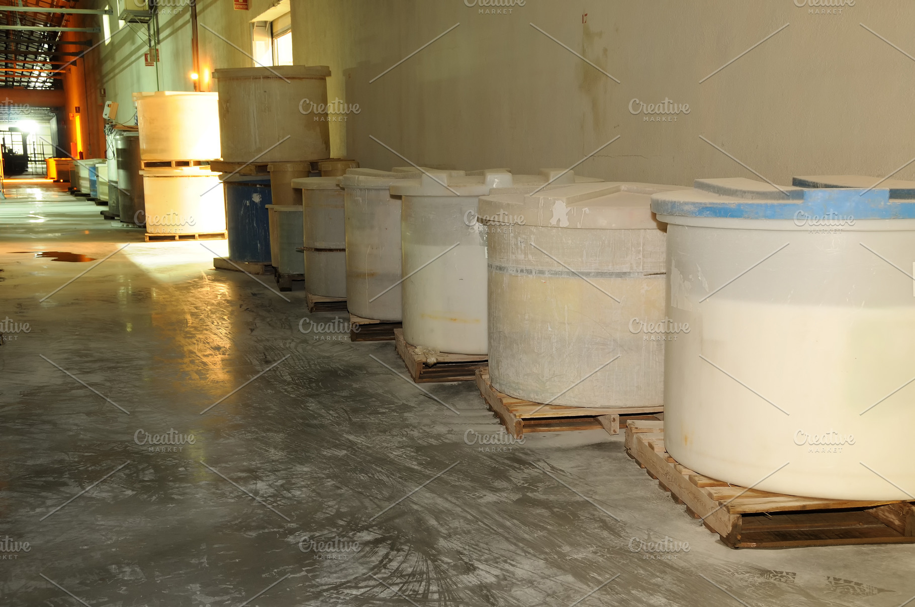 Industrial Glaze Containers in Ceramic Factory Corridor, an Industrial Photo by Davizro's Market