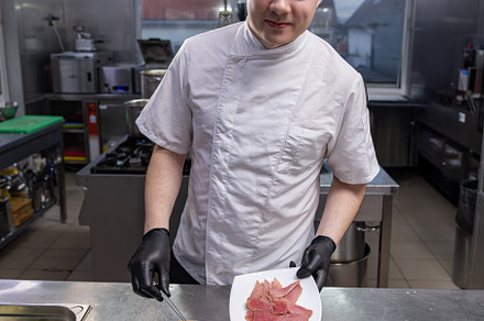 Chef preparing tuna salad, a Photo by Grafvision photography