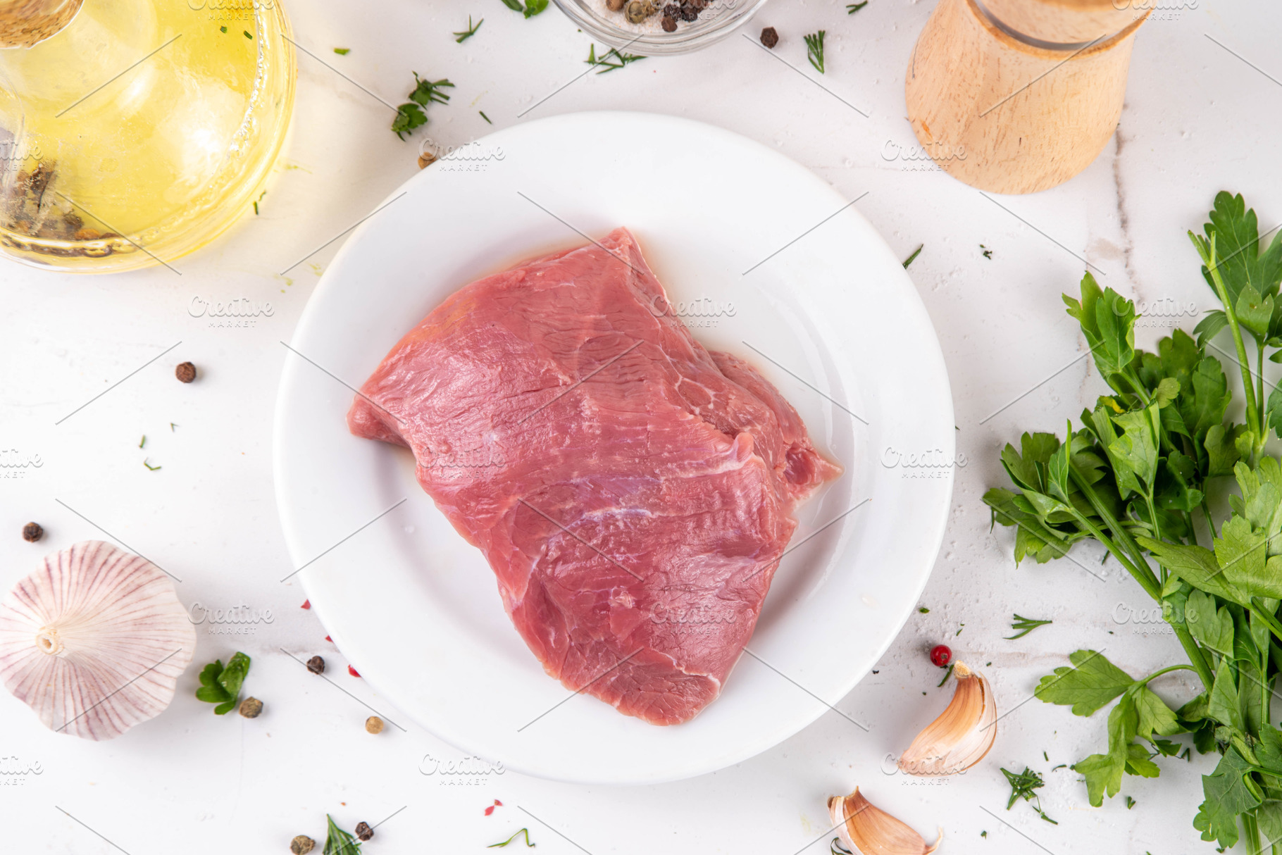 Raw meat, beef fillet, portioned piece on a cutting board with s, a Food & Drink Photo by Rimma
