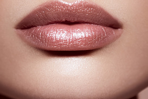 Woman's lips showing natural nude lipstick with glossy shine, be, a Beauty & Fashion Photo by Studio ANNA