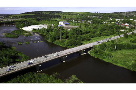 Aerial view of a river and a bridge, an Architecture Photo by Media Whale Stock