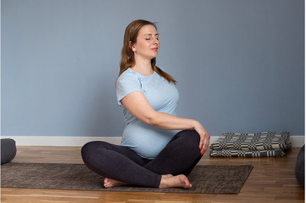 Pregnant caucasian woman sitting on, a Sports & Recreation Photo by Koldunov