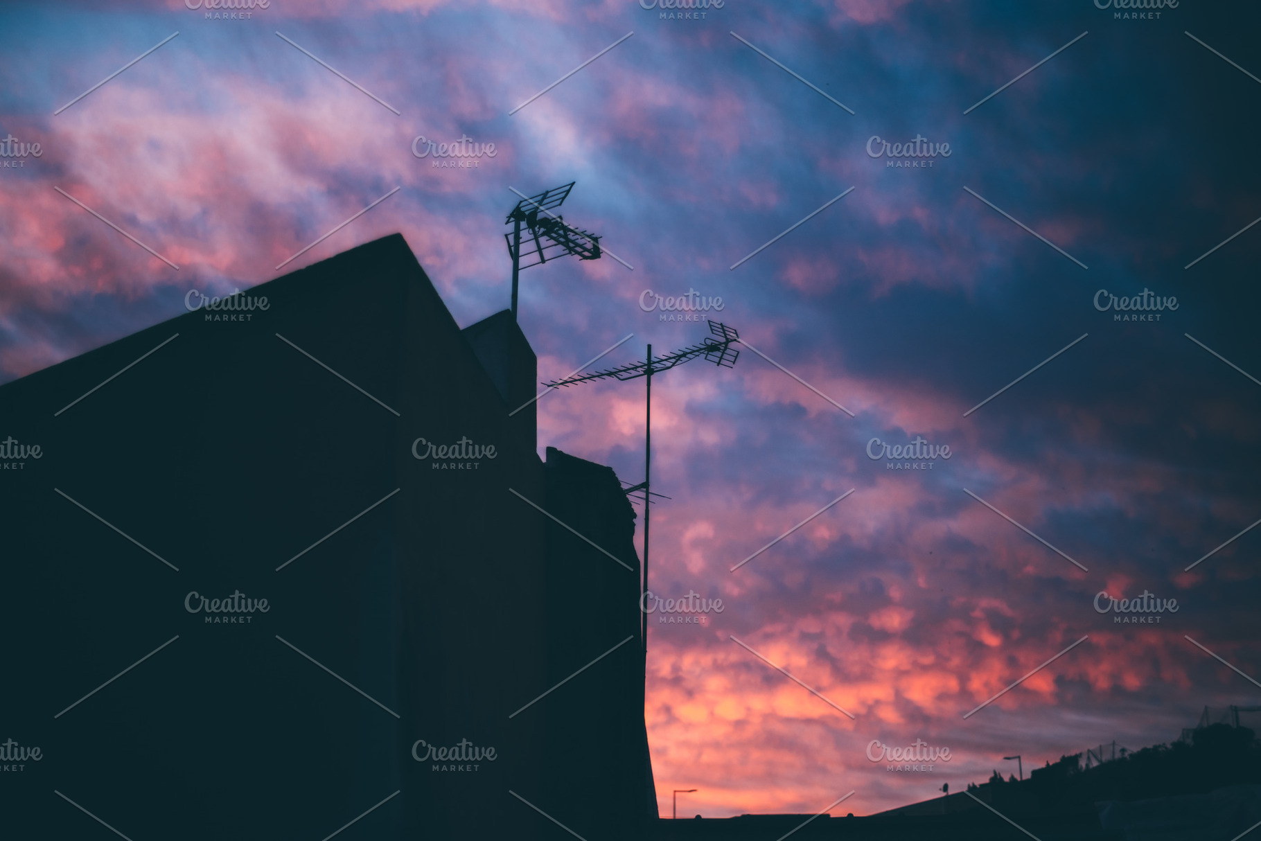 Rooftop antenna silhouette; dusk sky, an Architecture Photo by SkyNext