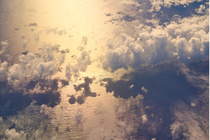 Clouds over the ocean at sunset, a Nature Photo by Oleksandr Berezko