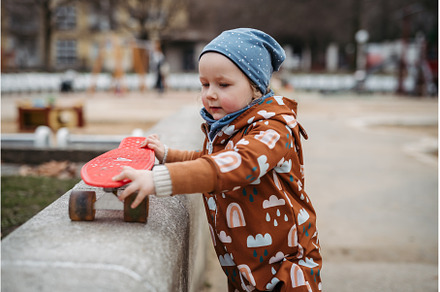 Cute toddler girl playing outdoor in, a Nature Photo by HalfPoint