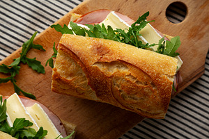 Homemade French Ham and Brie Baguette with Arugula Greens, top v, a Food & Drink Photo by LiudmylaChuhunova