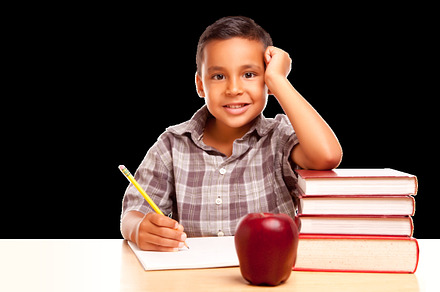 Young Hispanic School Boy At Desk, a Photo by Andy Dean Photography