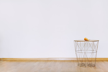 Wall mockup with small table in minimalist style, an Abstract Photo by Dvoevnore photos