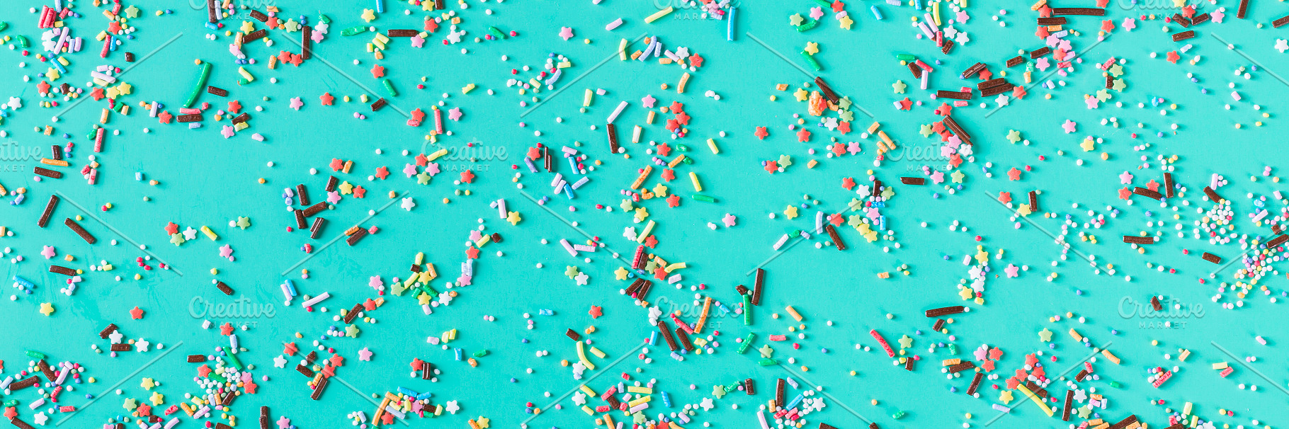 Festive sprinkles of sugar sweets. Party, birthday, holiday back, a Holiday Photo by Antonina Vlasova