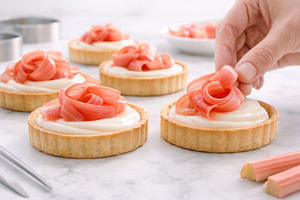 Rhubarb tarts on white marble backgr, a Photo by Dvoevnore photos